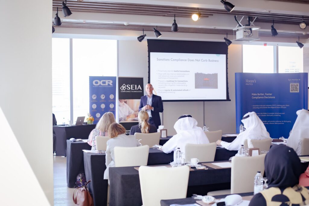 Image of a speaker, delivering a speech at a conference in dubai 